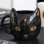 magick black cat face mug