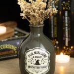 mischief and magic potion bottle vase and candle holder
